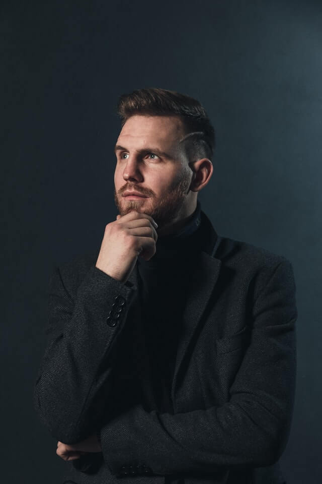Home 1 man in black suit jacket